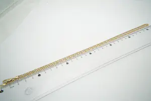 48 - Sierlijk en relatief lang 14 Krt bicolor gouden "fantasie" ketting kopen? Bied vanaf 950!