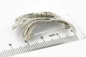 Sierlijke vintage Wit gouden (14kt) diamanten Broche kopen? Bied vanaf 230!