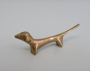 Curiosa - Zes mooie metalen messenleggers in de vorm van een teckel kopen? Bied vanaf 1!