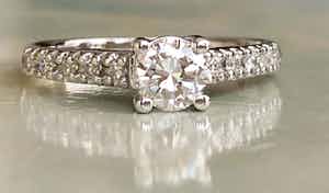 14 karaat witgouden ring met diamanten ca  0.36 ct verkocht voor € 400!