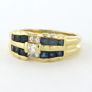 18k geelgouden ring met saffier en baguette geslepen diamant 0.30ct kopen? Bied vanaf 625!