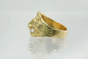 17 - Mooi gedetailleerde 18 Krt geel-gouden Leeuwenkop ring kopen? Bied vanaf 275!