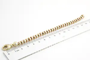 44- Aparte,  14 karaats gouden kinder/dames "ringetjes" model armband kopen? Bied vanaf 430!