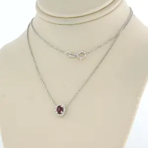 14k wit gouden collier met hanger met robijn en briljant geslepen diamant kopen? Bied vanaf 170!