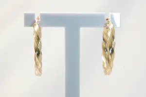 89 - 14 karaats paar geelgouden holle gedraaide oorringen kopen? Bied vanaf 195!