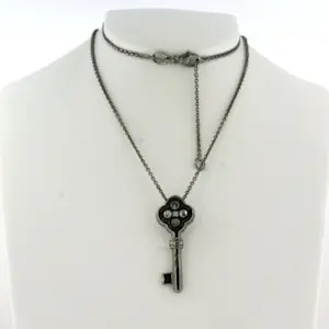 18k goud zwart gerodineerd collier en hanger met bergkristal en diamant kopen? Bied vanaf 710!