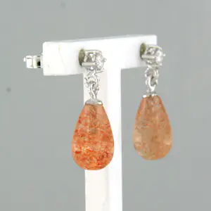 18k wit gouden oorhangers met zonnesteen en briljant geslepen diamant tot.0.09ct kopen? Bied vanaf 230!