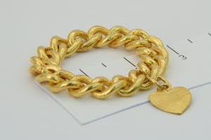 2535 - mooie 22 karaats geel-gouden schakelring met harthangertje - gekeurd kopen? Bied vanaf 370!