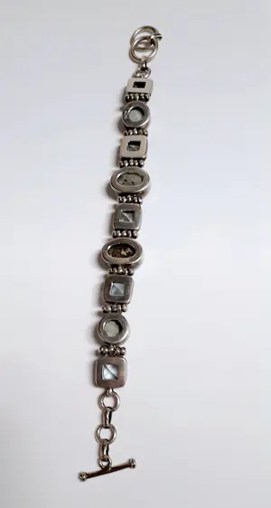 Zilveren Armband bezet met ovale facetgeslepen Aquamarijn en ovale turkoois kopen? Bied vanaf 85!