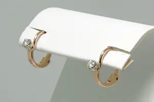 79 - 1 paar charmante 14krt rosé-gouden oorclips met 0.15ct diamant kopen? Bied vanaf 80!