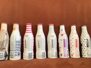Jean Paul Gaultier - Marc Jacobs, Karl Lagerfeld design flessen en Coca Cola glazen kopen? Bied vanaf 1!