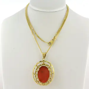 14k geel gouden collier met hanger bezet met koraal -  8.8 gram - 45 cm lang kopen? Bied vanaf 850!