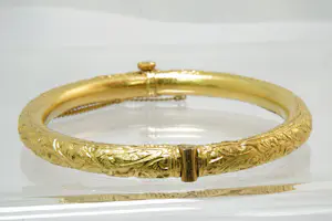 68- Fraai bewerkte Surinaamse 18Krt geel gouden armband met onedele kern kopen? Bied vanaf 370!