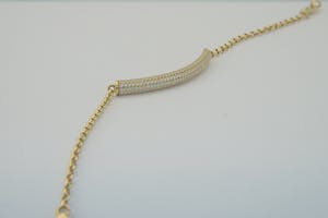 2510-  18 karaats geel-gouden armband - kinder/dames model - 5 rijen zirkonia kopen? Bied vanaf 110!