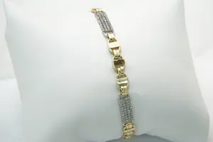 Acheter69 - 14 karaats bicolor gouden armband met tussen plaatjes gezet met steentjes? Enchérissez de 560!