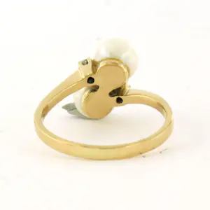 18k geel gouden ring bezet met parel en single cut geslepen diamant tot. 0.03ct kopen? Bied vanaf 260!