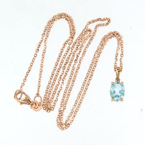 14K Goud - rood gouden collier met hanger bezet met topaas kopen? Bied vanaf 160!