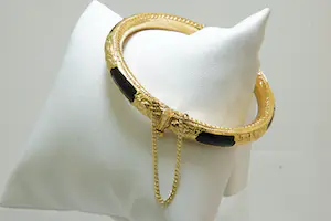 6 - grote Surinaamse 14Krt geel gouden armband met zwarte kunststof kern kopen? Bied vanaf 450!