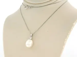 14k witgouden collier en hanger met parel en briljant geslepen diamant 0,10ct kopen? Bied vanaf 360!