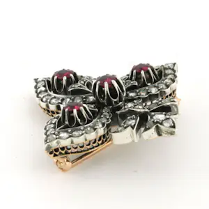 18k gouden broche bezet met robijn en diamant kopen? Bied vanaf 1200!