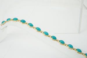 2062- elegante 14 karaats geel-gouden armband gezet met turkoois edelstenen. kopen? Bied vanaf 210!
