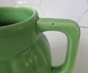 Niet of onleesbaar gesigneerd - Art deco licht groene aardewerken kan van Orchies model N3 kopen? Bied vanaf 1!