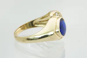 62 - 14 karaat geel gouden ring met blauwe cabuchon geslepen hartvormige steen kopen? Bied vanaf 200!