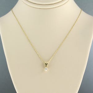 Buy 14k collier met solitair hanger bezet met briljant geslepen diamant 0,10ct? Bid from 160!