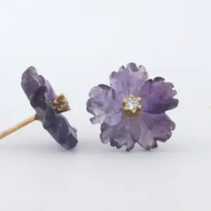 18k rose gouden oorknoppen met amethist en briljant geslepen diamant 0.08 ct kopen? Bied vanaf 185!