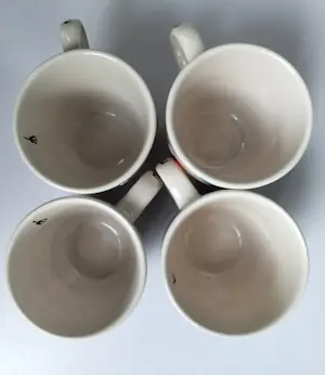 N.V. Porselein- en Tegelfabriek Mosa - Marianne Rebel - koffiebekers (4) kopen? Bied vanaf 20!