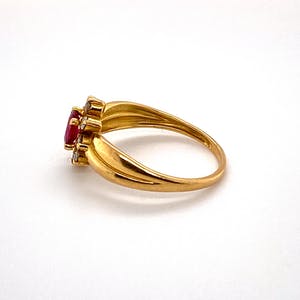 18kt gouden entourage ring met diamant en robijn  maat52,5 (16,75) 2,17gr kopen? Bied vanaf 240!
