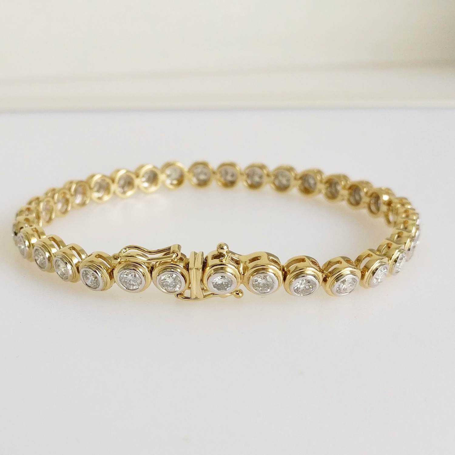 18 karaats geelgouden diamanten armband kopen? Bied vanaf 7500!