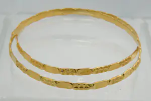 41 - Set van TWEE hoog-gehalte 22Krt geel- gouden "rinkel" armbanden kopen? Bied vanaf 930!