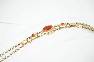 Elegante 14 karaats geel-gouden dames armband gezet met bloedkoraal kopen? Bied vanaf 240!