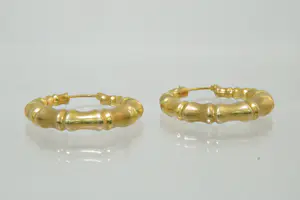 33- Groot paar 14 karaats  geel gouden oorclips - bamboe model kopen? Bied vanaf 140!