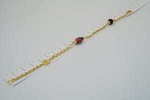 2523-  Surinaams 18 karaats geel-gouden zg. Alla Kondre armband - gekeurd kopen? Bied vanaf 180!