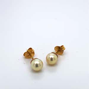 18kt gouden oorsteker+parel, 1,31 gr verkocht voor € 80!