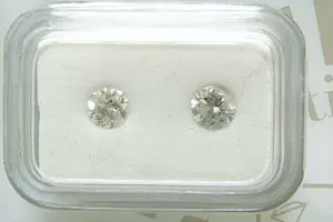 105 - Twee losse briljant geslepen diamanten met IGL certificaat kopen? Bied vanaf 595!