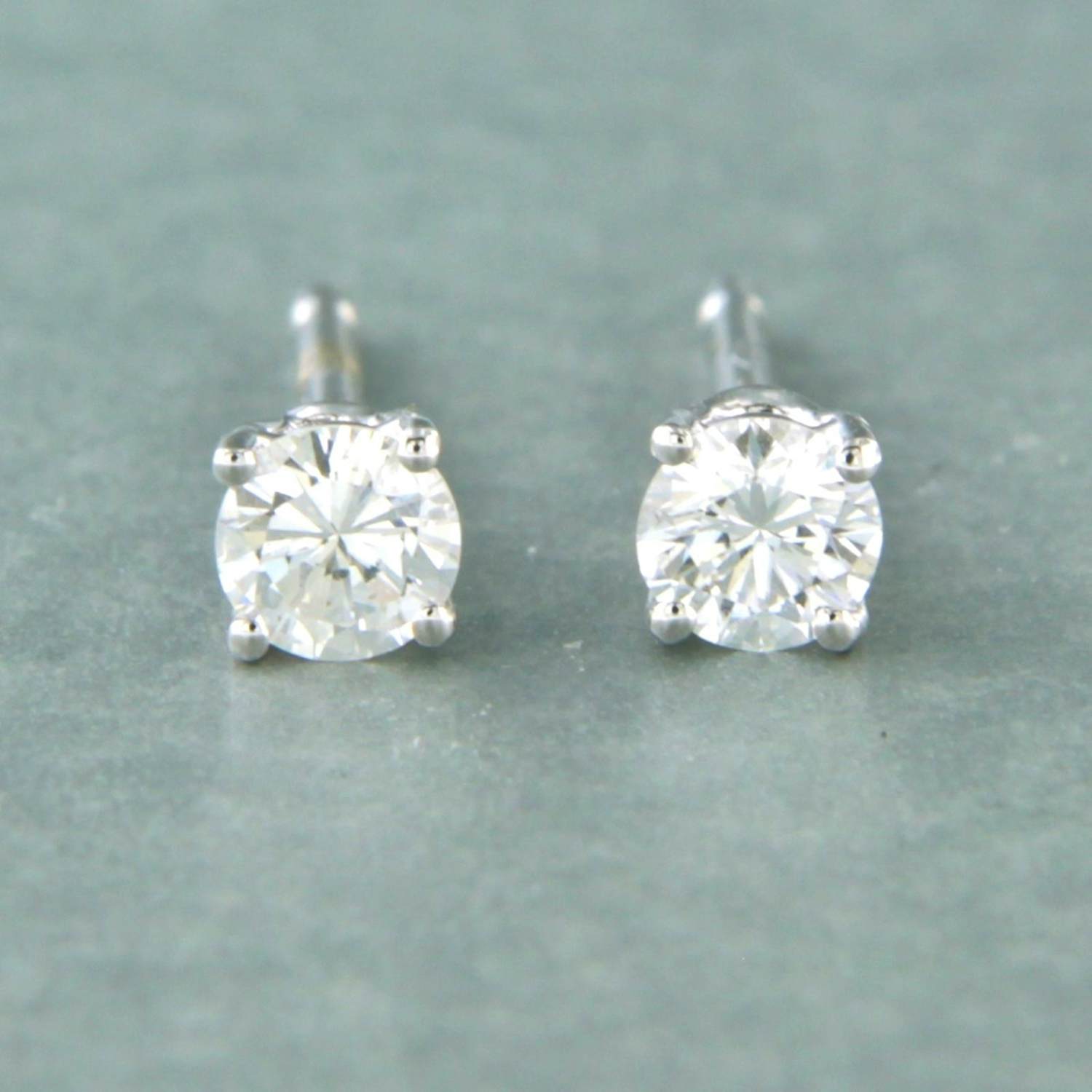 18k wit gouden solitair oorknoppen met briljant geslepen diamant tot. 0,26ct verkocht voor € 340!