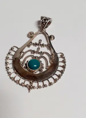 Nieuwe Zilveren hanger met turquoise uit 1985 kopen? Bied vanaf 45!