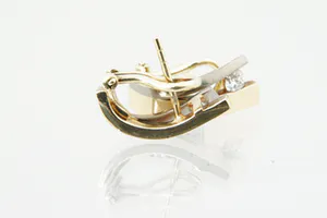 Prachtige set 18 krt bi-color gouden dames oorclips gezet met ca 0.30ct diamant. kopen? Bied vanaf 350!