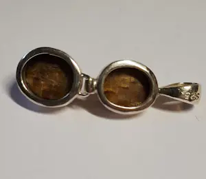 Nieuwe langwerpige zilveren hanger met een mooie  tijgerogen kopen? Bied vanaf 70!