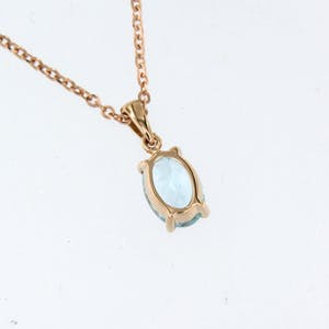 14K Goud - rood gouden collier met hanger bezet met topaas kopen? Bied vanaf 160!