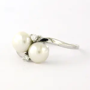 14k wit gouden ring bezet met parels en briljant geslepen diamant tot. 0.06ct kopen? Bied vanaf 210!