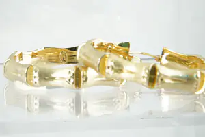 52 - Paar geelgouden 18Krt bamboe oorringen kopen? Bied vanaf 150!