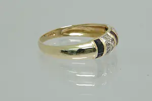 92 - Fraaie 14Krt geelgouden ring met diamant ca 0.15 crt achtkant kopen? Bied vanaf 80!