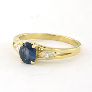 Acheter18k gouden ring met saffier tot. 0.88ct en marquise geslepen diamant tot.0.20ct? Enchérissez de 685!
