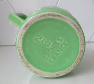 Niet of onleesbaar gesigneerd - Art deco licht groene aardewerken kan van Orchies model N3 kopen? Bied vanaf 1!