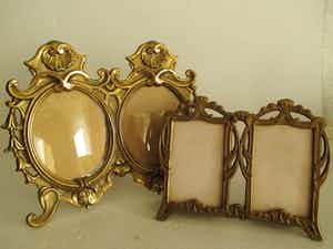 Twee bronzen/koperen dubbele fotolijsten onder glas verkocht voor € 50!