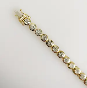 18 karaats geelgouden diamanten armband kopen? Bied vanaf 7500!